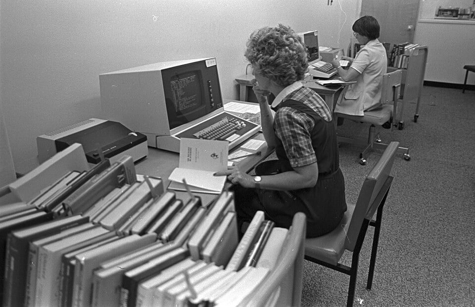 Library Employees Working At Computers, UTA Central Library